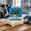 2 games on the beach hockey soap bar on a wooden bench inside a locker room with hockey gear in the background