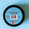 The back of a tin of Dirty Dangles Hockey Stick Wax Blue Cotton Candy Scent sits on a blue background.