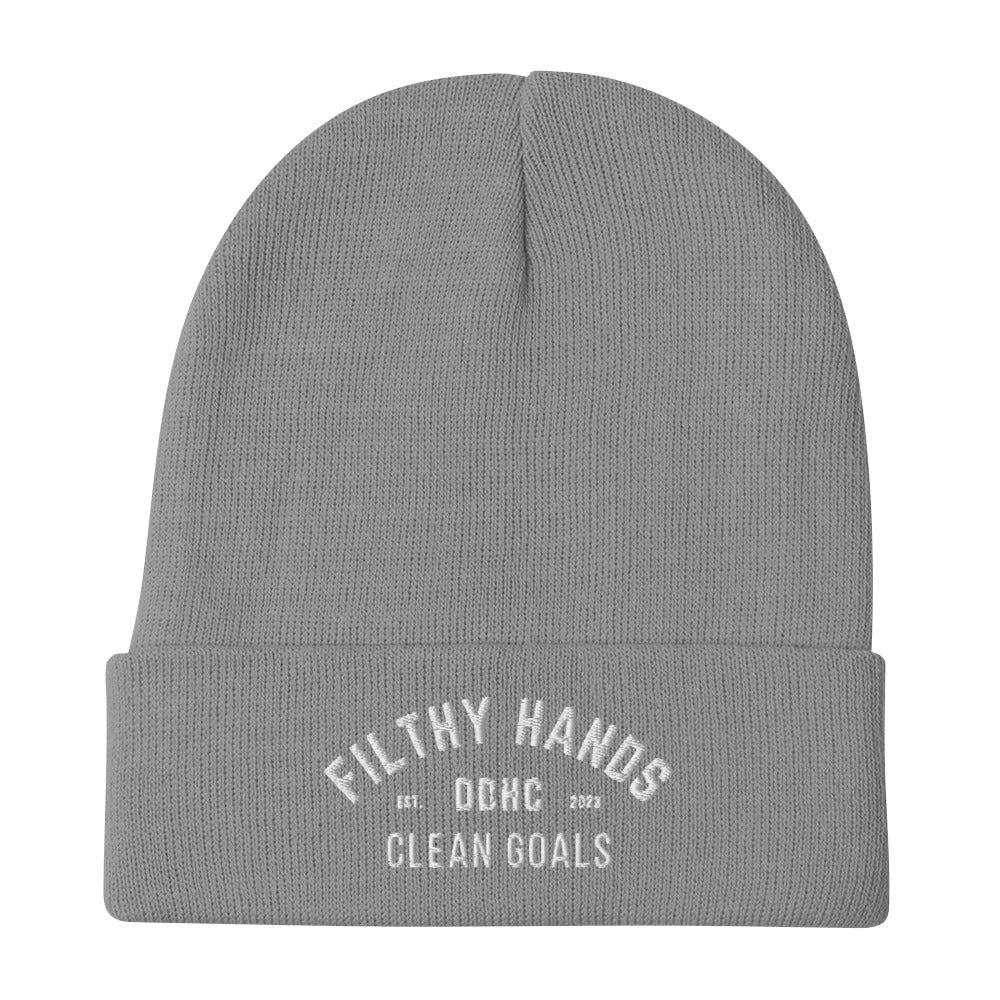 A gray dirty dangles knit hockey beanie on a white background. Filthy Hands Clean Goals