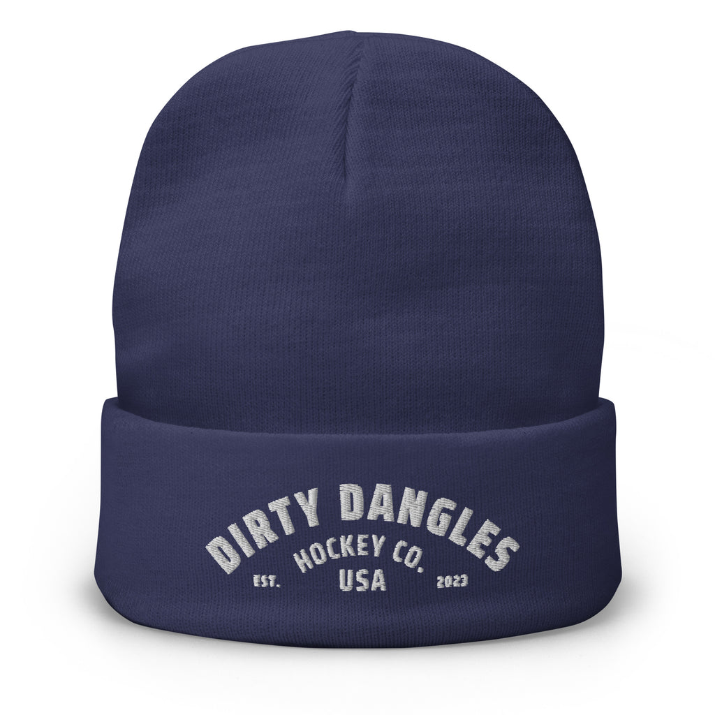 A navy blue dirty dangles knit hockey beanie on a white background. Dirty Dangles hockey co.