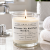 A white scented hockey candle in a bathroom. Because my kid plays hockey.... 