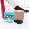 A tan soap bar on a snowy hockey background. Silky mitts scent