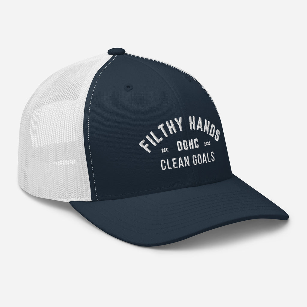 A black and blue snapback trucker hat on white background. Filthy hands clean goals