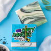 ODR fresh mountain air hockey soap bar on a blue background with charcoal, aloe and fresh linen