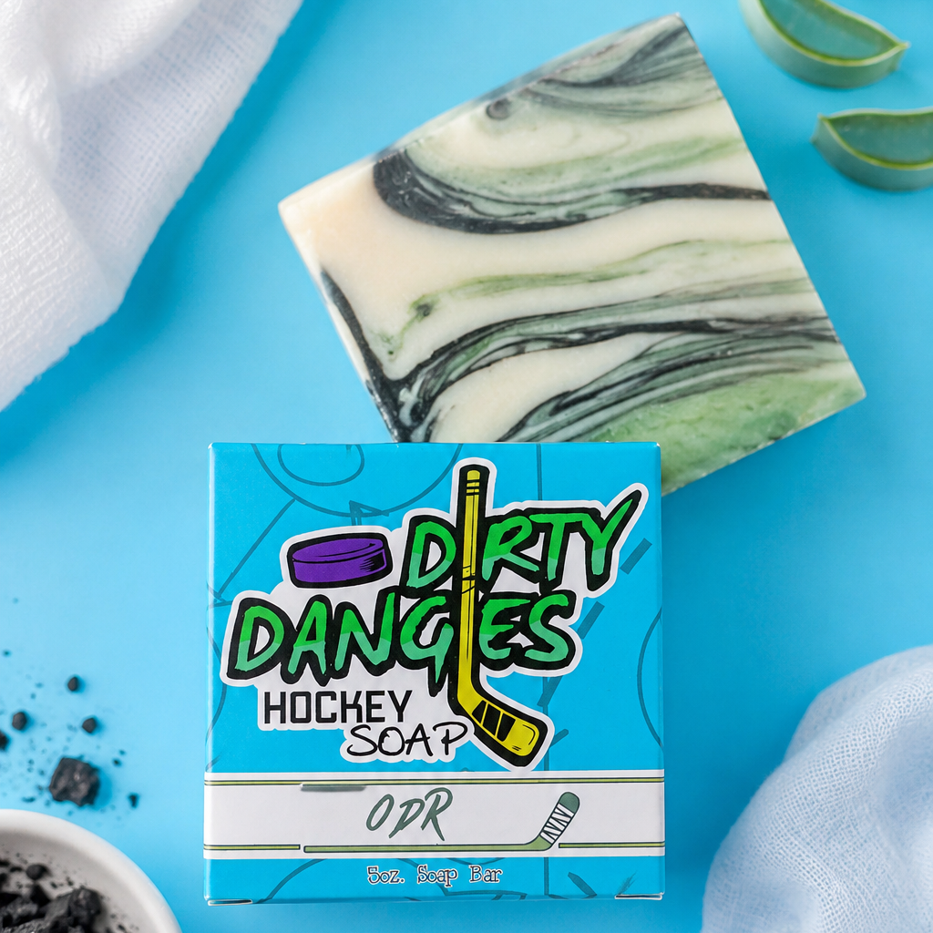 ODR fresh mountain air hockey soap bar on a blue background with charcoal, aloe and fresh linen