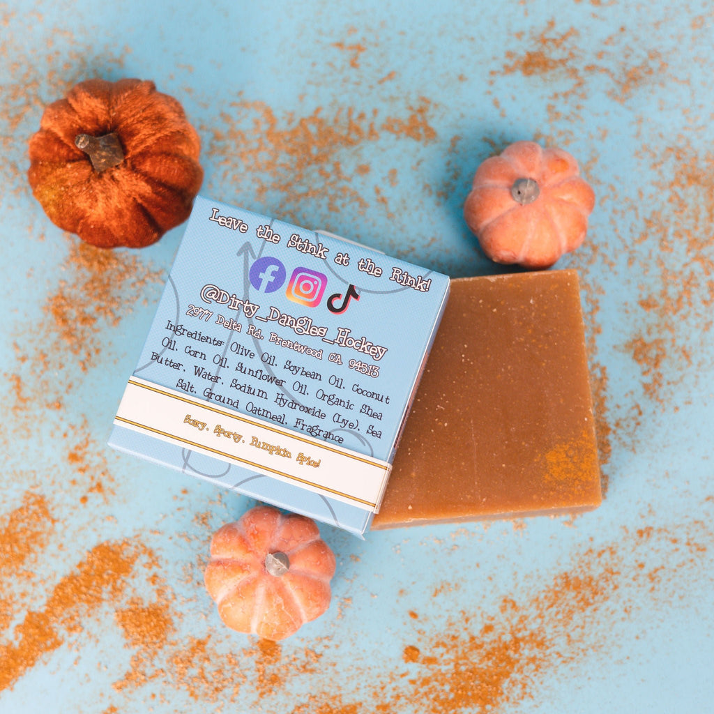 a box of dirty dangles slashing pumpkins pumpkin spice soap bars on cinnamon and pumpkin background