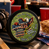 A tin of dirty dangles screamin eagle 4th of july stick wax on a truck tailgate with apple pie and american flags