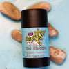 A tube of dirty dangles aluminum-free the michigan fresh scented natural hockey deodorant on a blue background with water and rocks