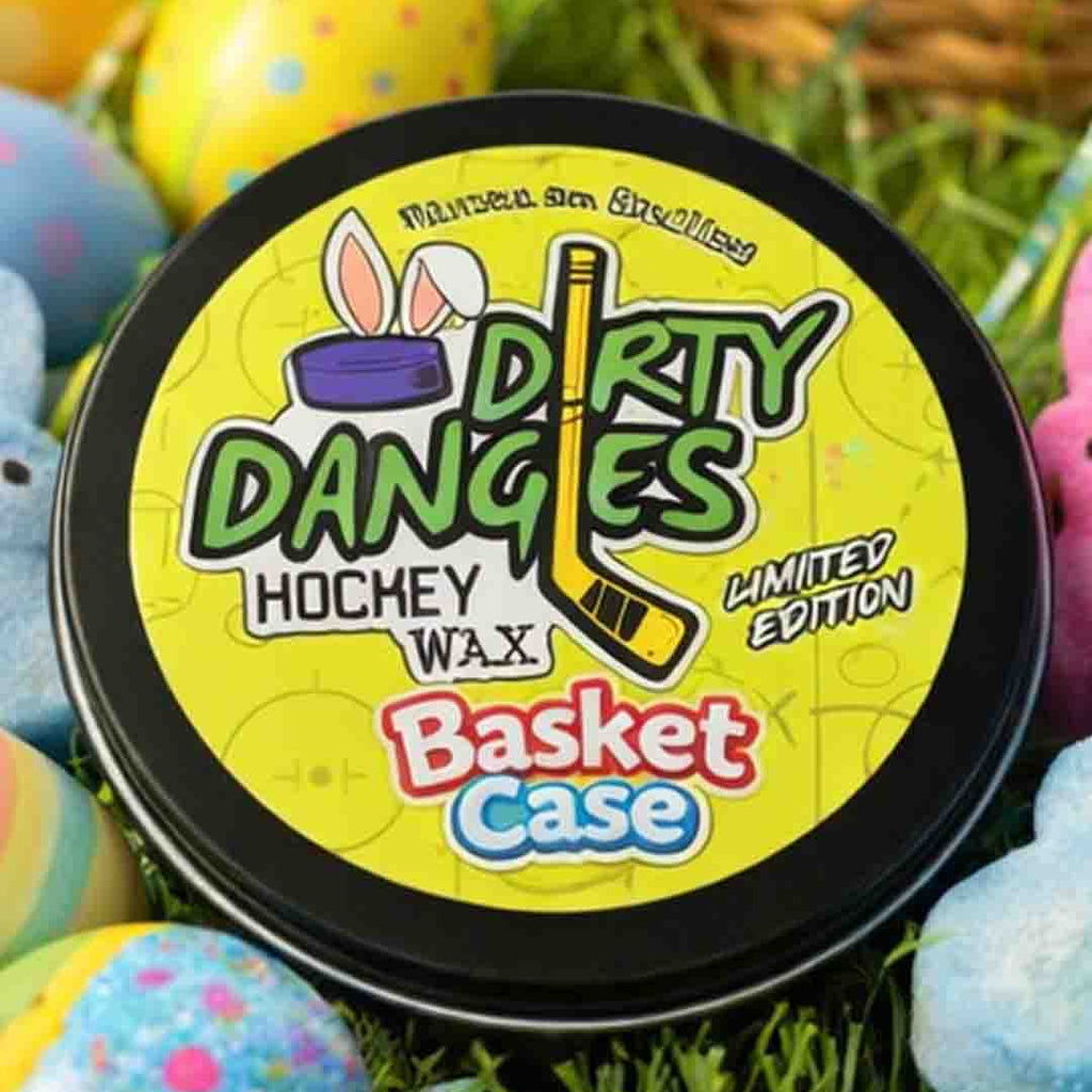 Tin of Dirty Dangles Basket Case marshmallow candy scented hockey wax with Easter eggs and a basket in the background
