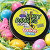 Dirty Dangles Basket Case marshmallow candy scented hockey wax in a Easter basket with colorful eggs and Peeps candies.