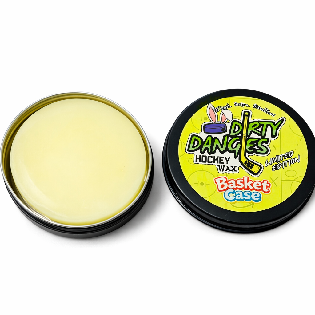 An open tin of Dirty Dangles Basket Case marshmallow candy scented Hockey Wax on a white background
