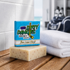 A white and orange beer league hero grapefruit pale ale soap bar with a blue soap box inside a hockey locker room