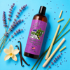 a bottle of certified beaut lavender lemongrass and vanilla girls hockey body wash on a blue background with lavender lemongrass and vanilla beans.