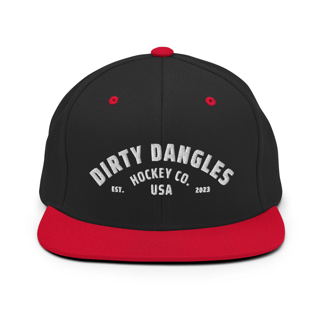 A black and red flat brim hat on white background. Dirty dangles hockey co.