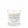 A white scented hockey candle on a white background. Move Your Feet