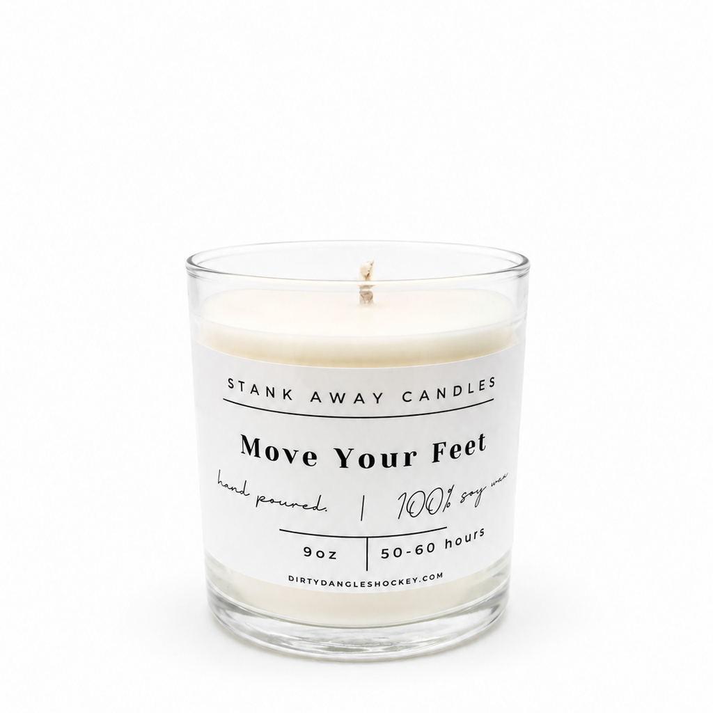 A white scented hockey candle on a white background. Move Your Feet