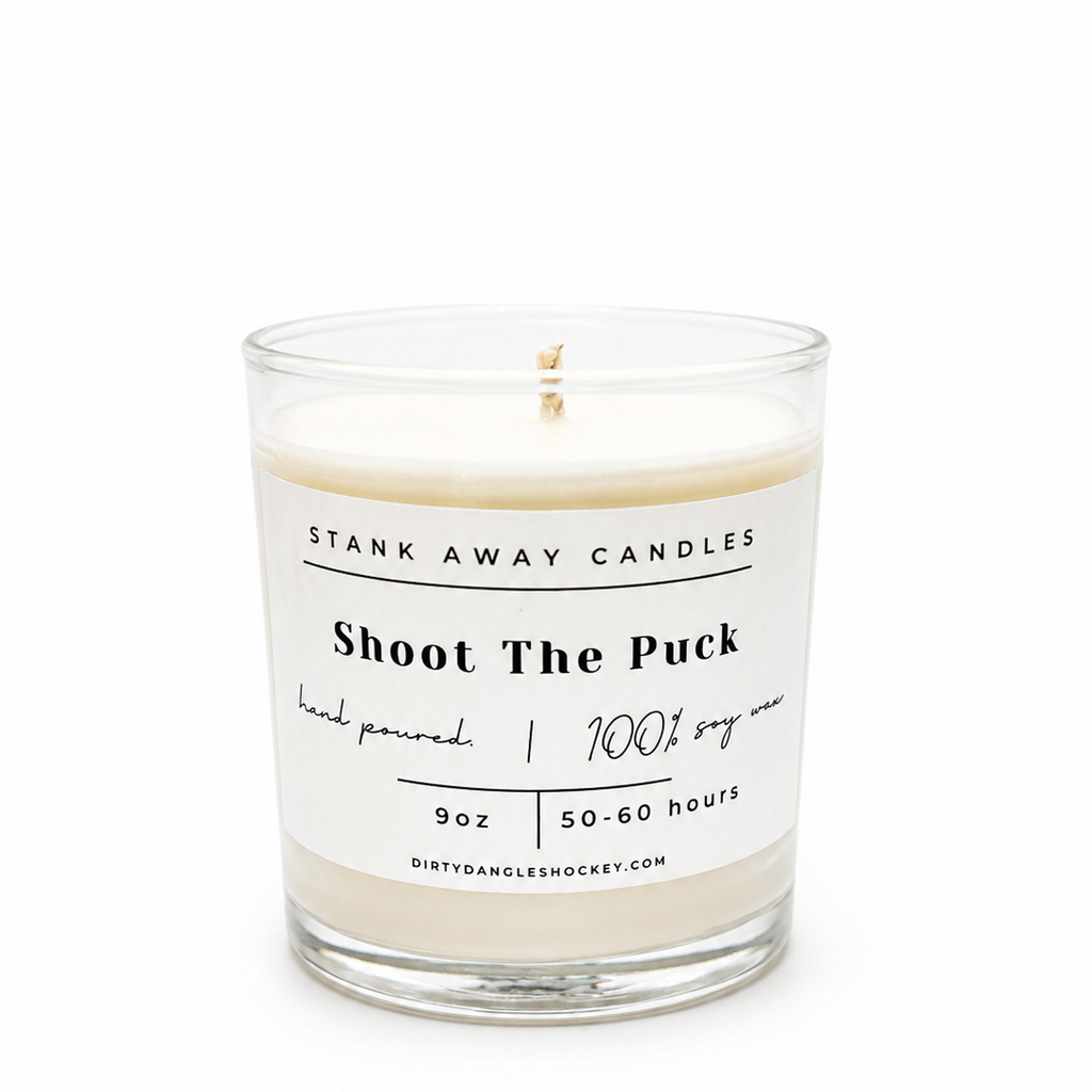 A white scented hockey candle on a white background. Shoot the puck