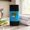 dirty dangles natural hockey Deodorant stick odr scent with blue label and black container on the counter in a bathroom with towels and aloe