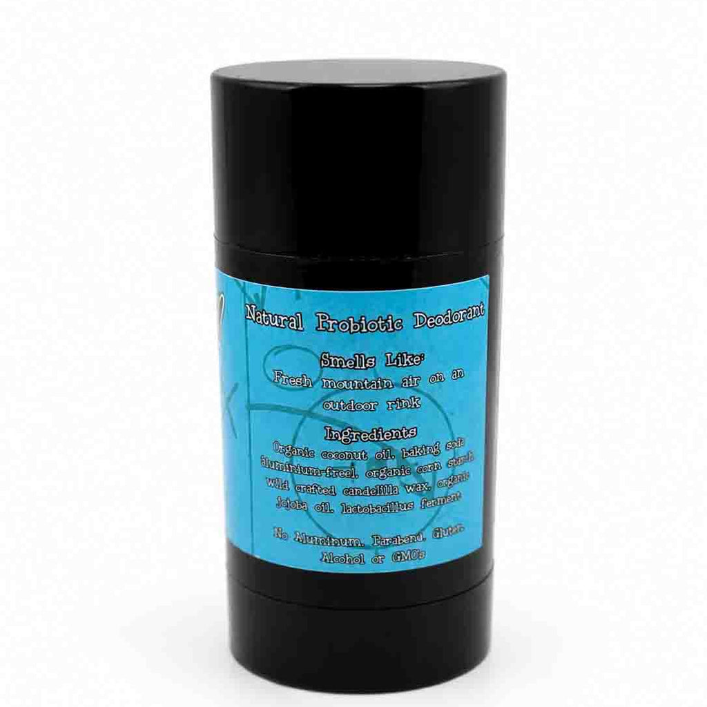 the back of a dirty dangles natural hockey Deodorant stick odr scent with blue label and black container on a white background