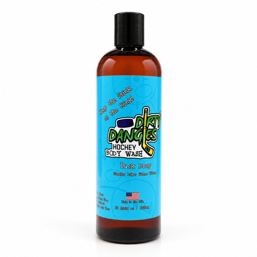 A 16 oz amber plastic bottle of Dirty Dangles puck drop scented Hockey Body Wash with a black cap and a bright blue label, shown on a white background.
