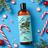 a bottle of reindeer farts christmas candy cane scented hockey body wash on a blue background with christmas trees, candy canes and red christmas ornaments.