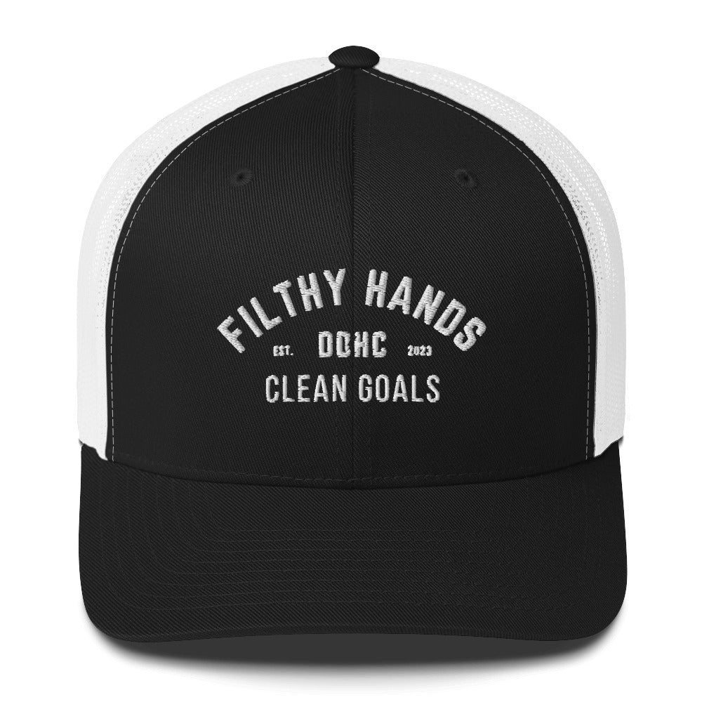 A black and white snapback trucker hat on white background. Filthy hands clean goals