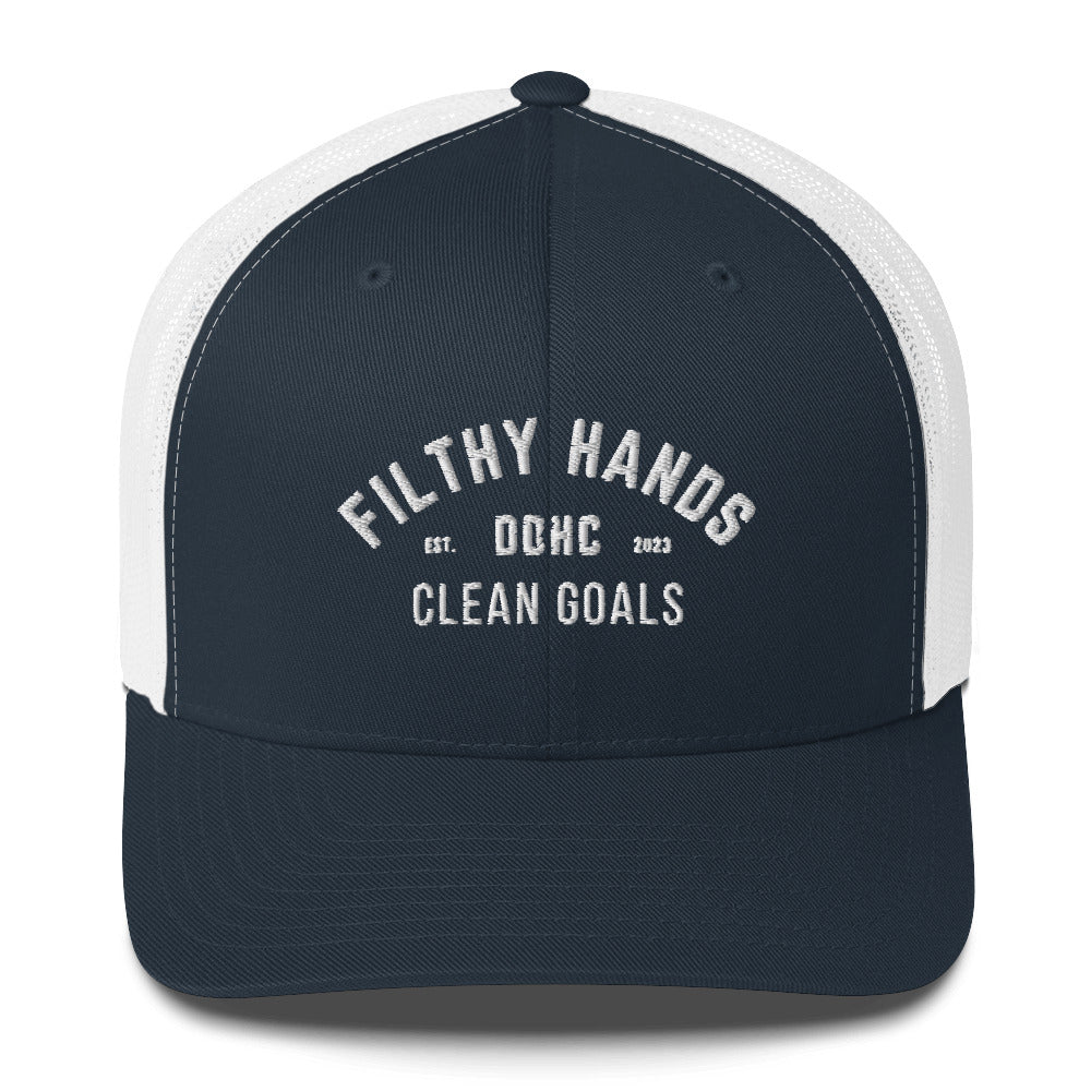 A black and blue snapback trucker hat on white background. Filthy hands clean goals