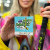 a female hockey player holding a brown silky mitts oatmeal milk and honey hockey soap bar