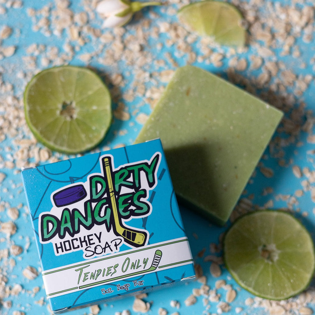 tendies only green jasmine lime hockey goalie soap on a blue background with limes, jasmine flowers and oatmeal