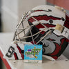 tendies only green jasmine lime hockey goalie soap on a bench with a red and white goalie helmet