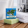 tendies only green jasmine lime hockey goalie soap in a locker room with goalie gear.