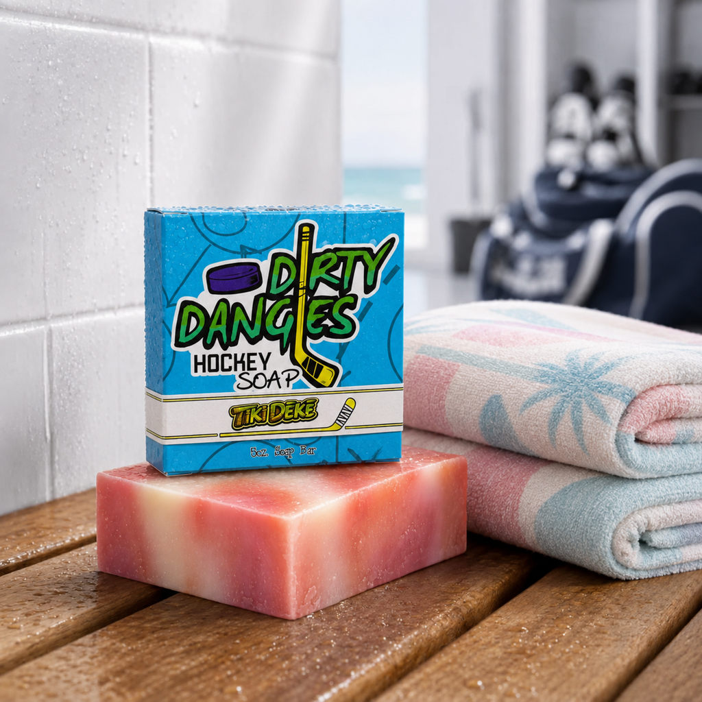 a bar of tiki deke tropical coconut girls hockey soap inside a clean hockey locker room with a pink white and blue beach towel.
