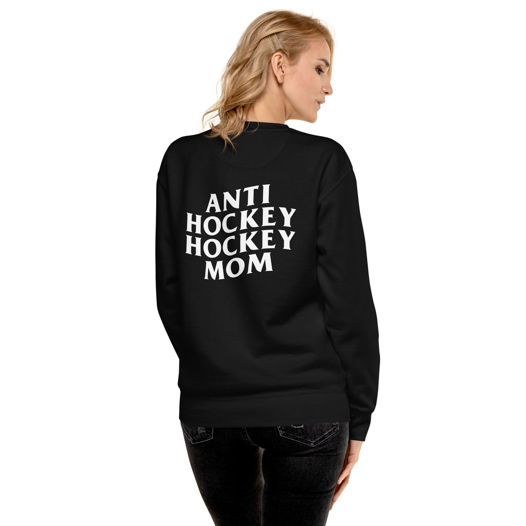A hockey mom showing the back of a black crew neck sweatshirt on a white background. Anti hockey hockey mom