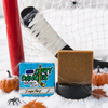 zombie sweat pumpkin spice scented hockey soap bar in the snow with a hockey stick, goal and halloween decor